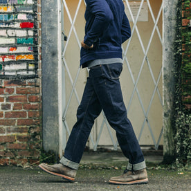 fit model walking in The Democratic Jean in Rinsed Organic Selvage
