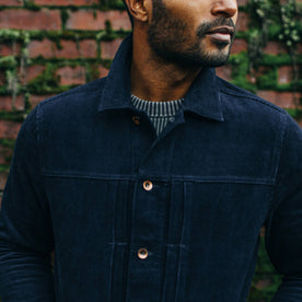 fit model wearing The Dispatch Jacket in Indigo Cord