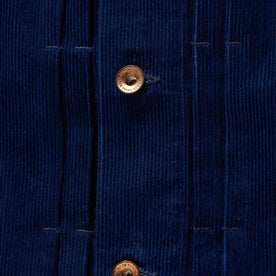 material shot of the buttons on The Dispatch Jacket in Indigo Cord