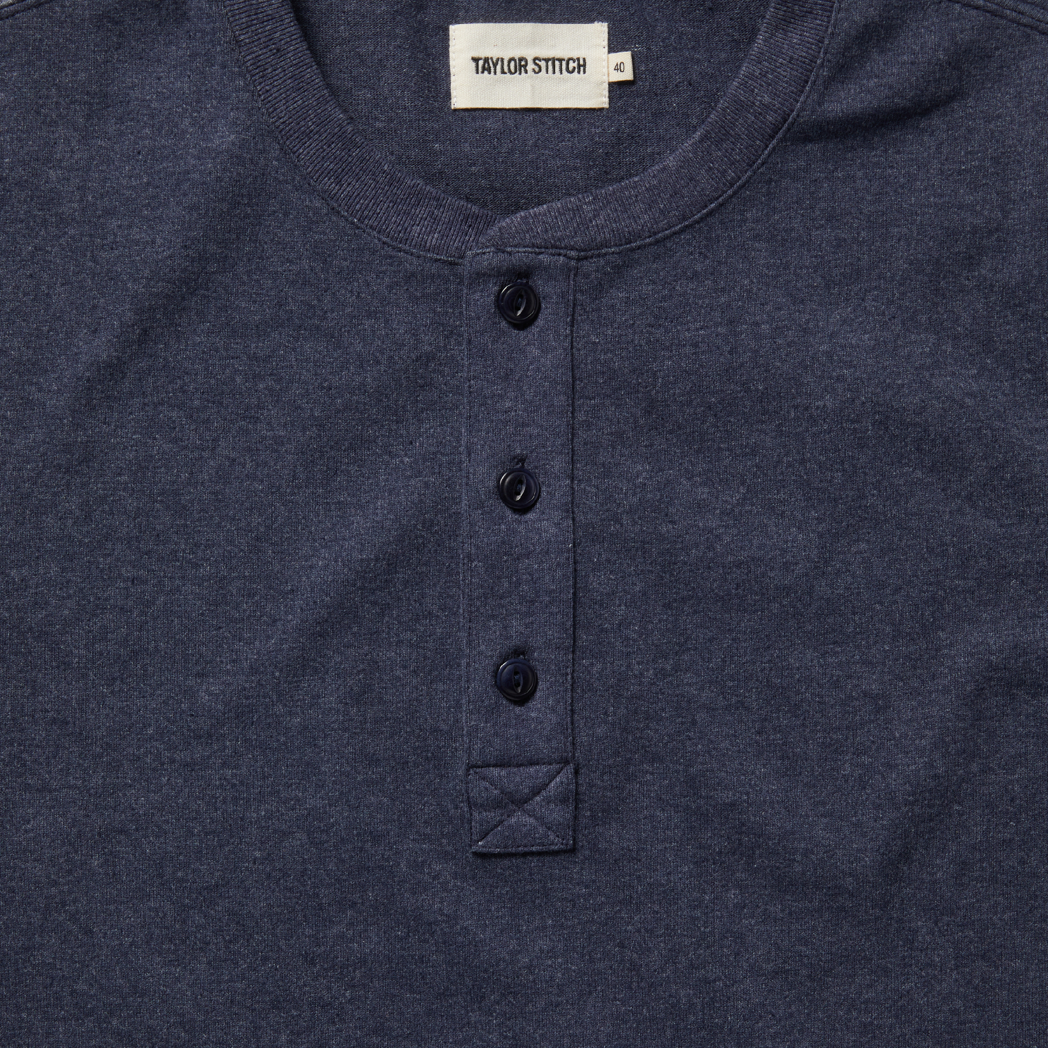 material shot of the buttons on The Short Sleeve Heavy Bag Henley in Dark Navy, Knits by Taylor Stitch