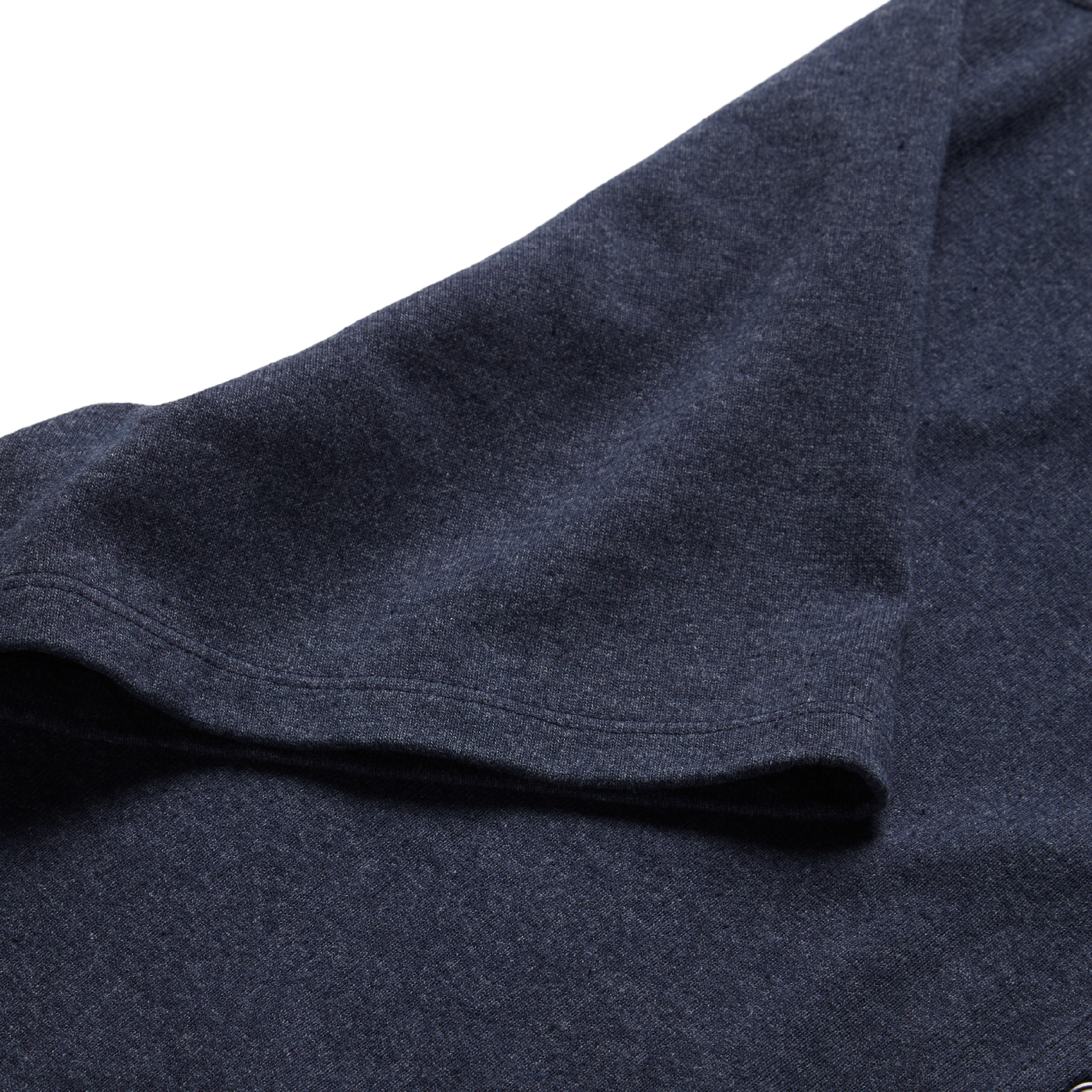 material shot of the sleeves on The Short Sleeve Heavy Bag Henley in Dark Navy, Knits by Taylor Stitch
