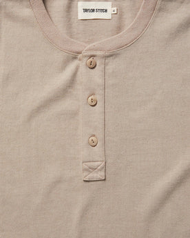material shot of the buttons on The Short Sleeve Heavy Bag Henley in Sand, Knits by Taylor Stitch