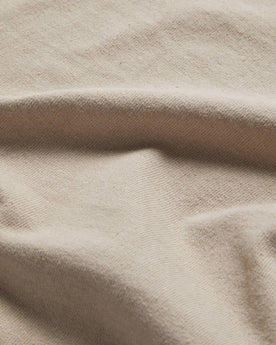 material shot of the fabric on The Short Sleeve Heavy Bag Henley in Sand, Knits by Taylor Stitch
