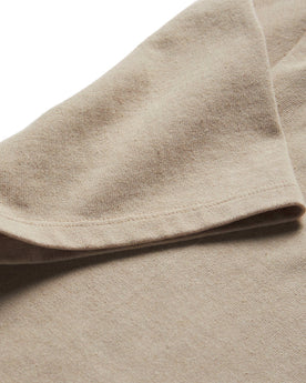 material shot of the sleeves on The Short Sleeve Heavy Bag Henley in Sand, Knits by Taylor Stitch