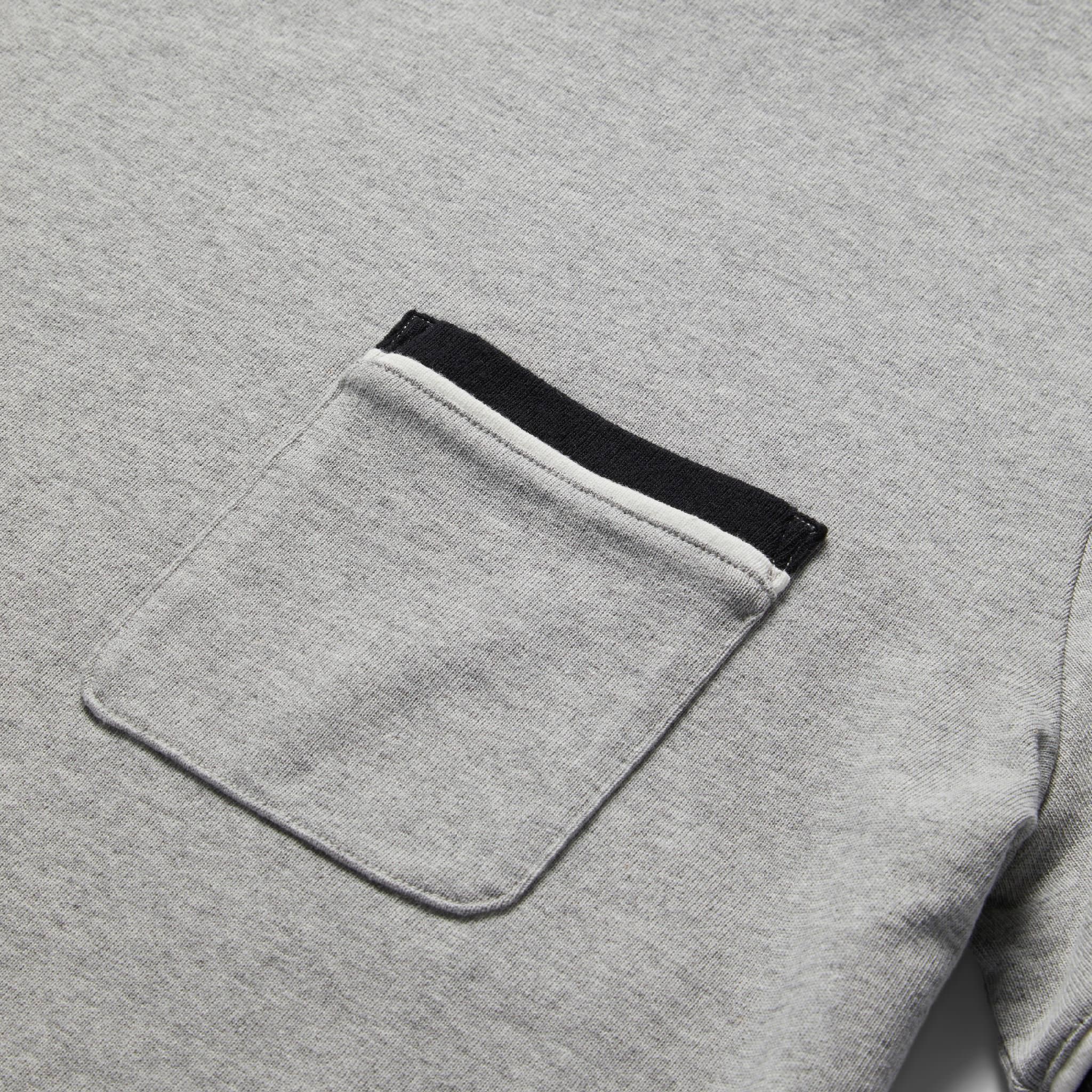 material shot of chest pocket of The Heavy Bag Ringer Tee in Aluminum, Knits by Taylor Stitch