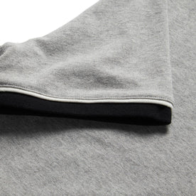 material shot of sleeve hem of The Heavy Bag Ringer Tee in Aluminum