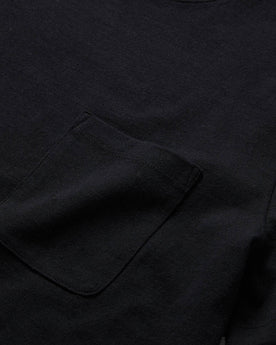material shot of the pocket detail on The Heavy Bag Tee in Black, Knits by Taylor Stitch