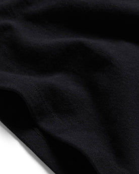 material shot of the edges on The Heavy Bag Tee in Black, Knits by Taylor Stitch