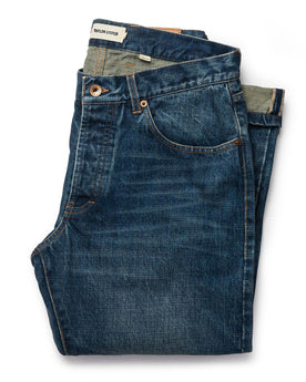 folded flatlay of The Democratic Jean in Sawyer Wash Organic Selvage, Bottoms by Taylor Stitch