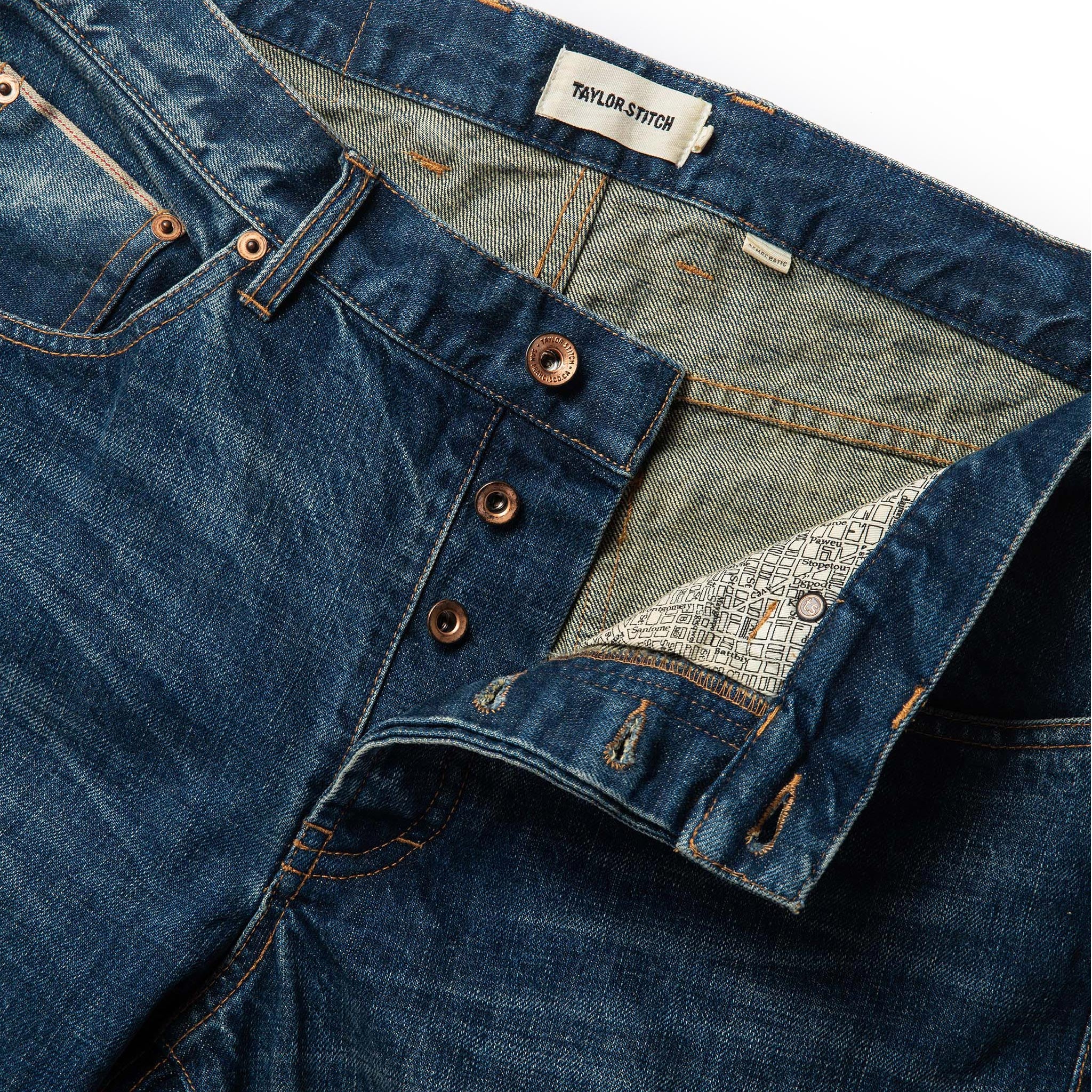 material shot of open button fly of The Democratic Jean in Sawyer Wash Organic Selvage, Bottoms by Taylor Stitch