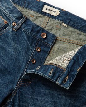 material shot of open button fly of The Democratic Jean in Sawyer Wash Organic Selvage, Bottoms by Taylor Stitch