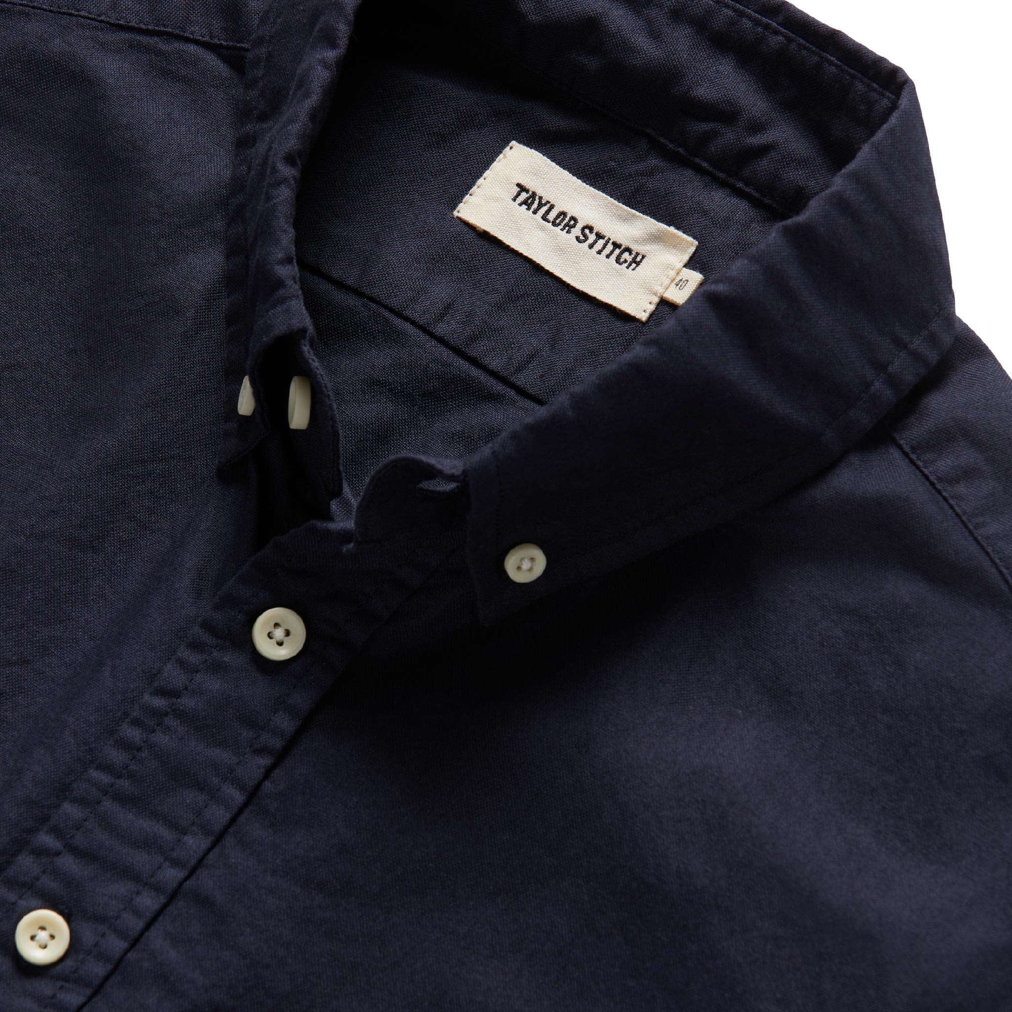 material shot of the interior label of The Jack in Dark Navy Oxford, Wovens by Taylor Stitch