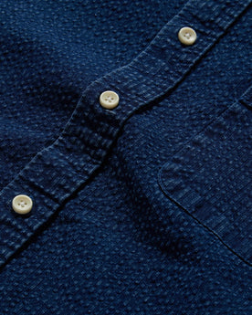 material shot of the buttons on The Short Sleeve Jack in Indigo Seersucker, Wovens by Taylor Stitch
