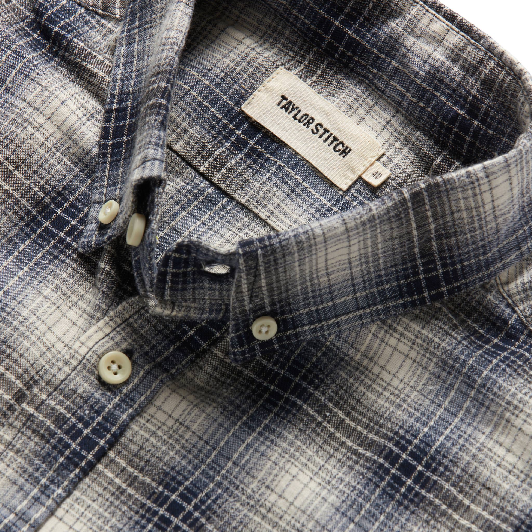 material shot of interior label of The Jack in Navy Plaid, Wovens by Taylor Stitch