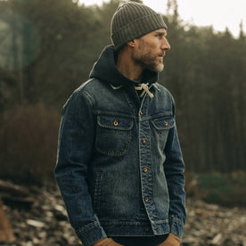 fit model wearing The Long Haul Jacket in Sawyer Wash Organic Selvage with hands in pockets