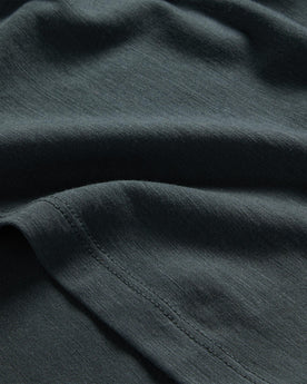 material shot of the hem on The Merino Tee in Dark Slate, Knits by Taylor Stitch