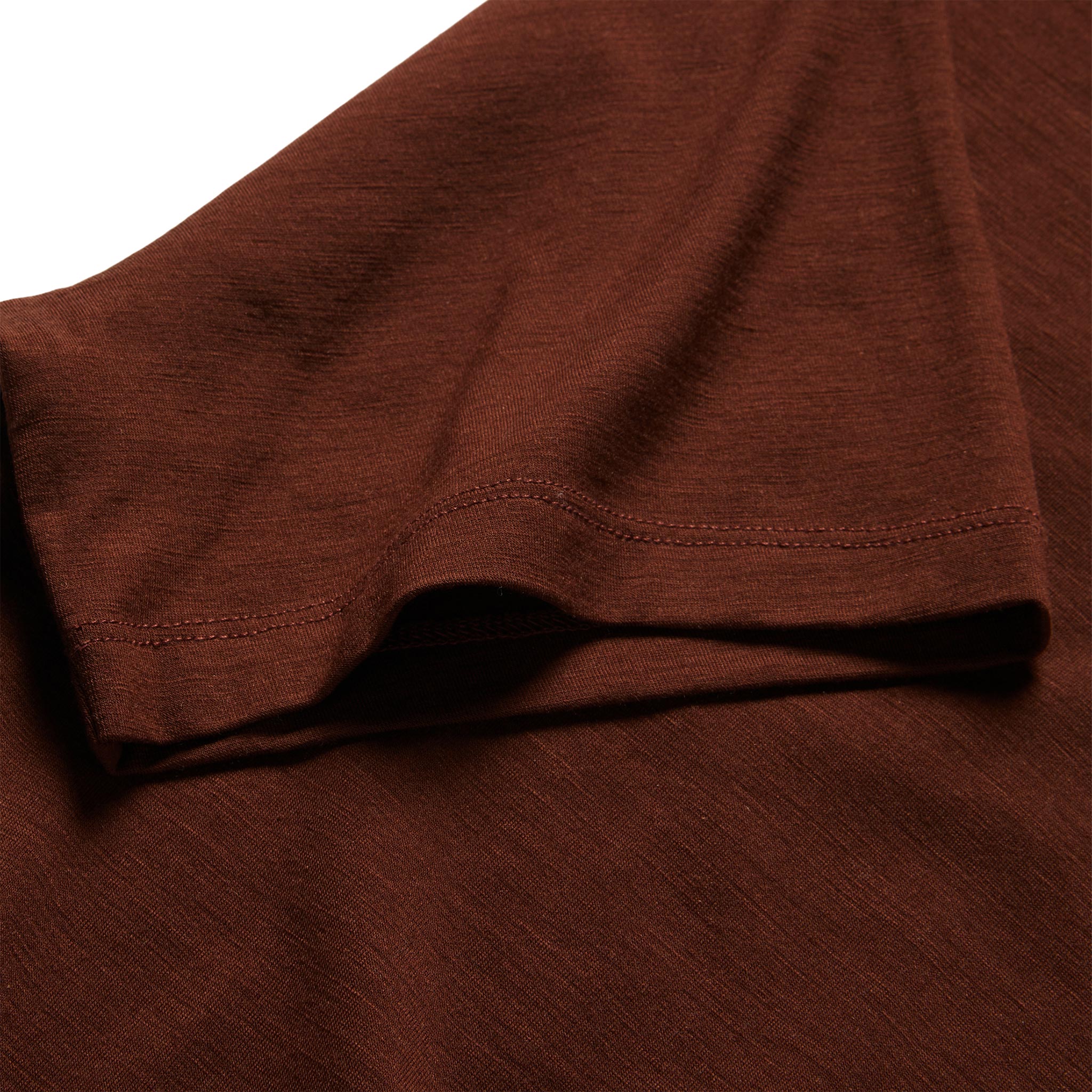 material shot of the sleeve on The Merino Tee in Russet, Knits by Taylor Stitch