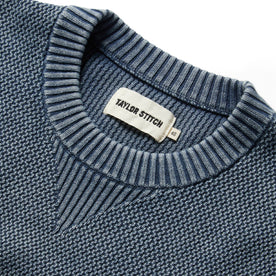 material shot showing collar and interior label of The Moor Sweater in Washed Indigo