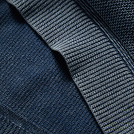 material shot showing rib hem of The Moor Sweater in Washed Indigo
