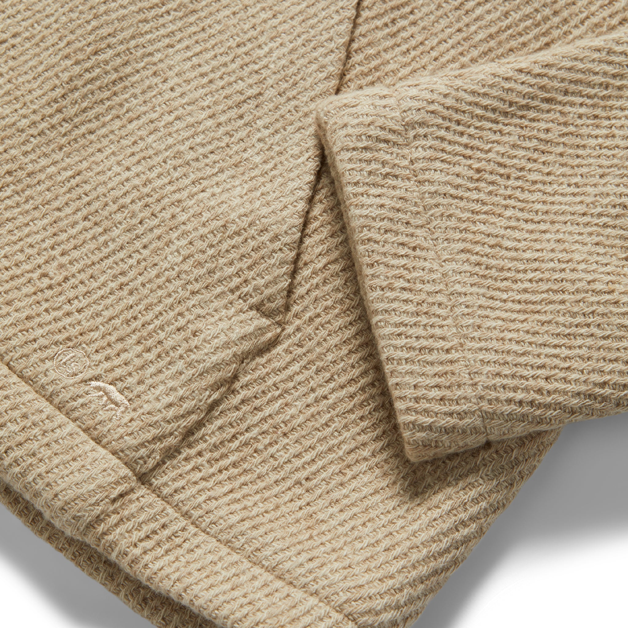 material shot of the texture on The Nomad Hoodie in Flax Twill, Knits by Taylor Stitch
