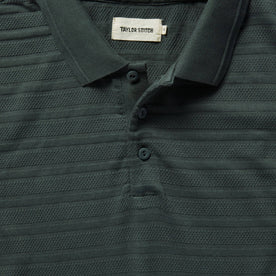 material shot of collar and placket of The Polo in Dark Slate Jacquard
