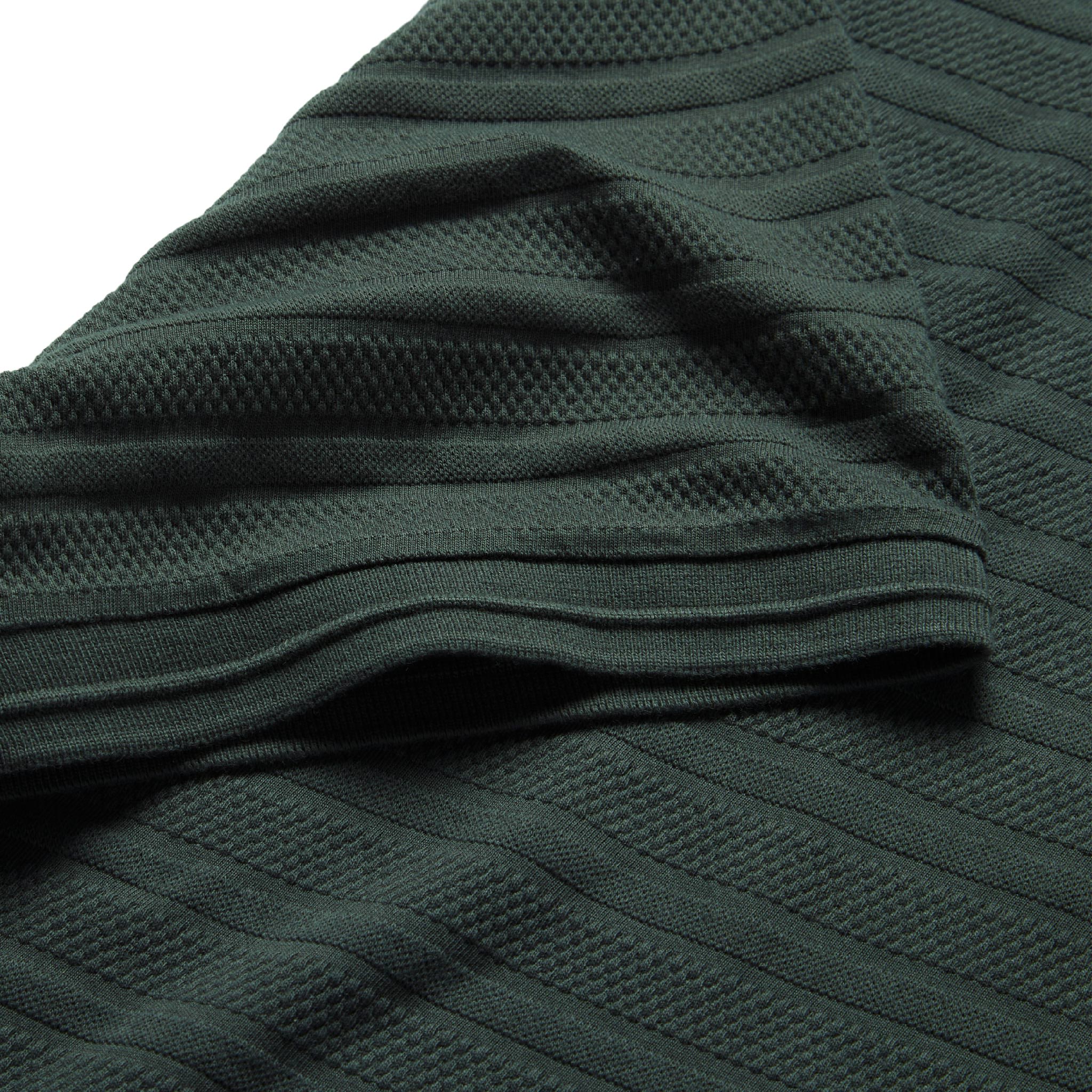 material shot of sleeve hem of The Polo in Dark Slate Jacquard, Knits by Taylor Stitch