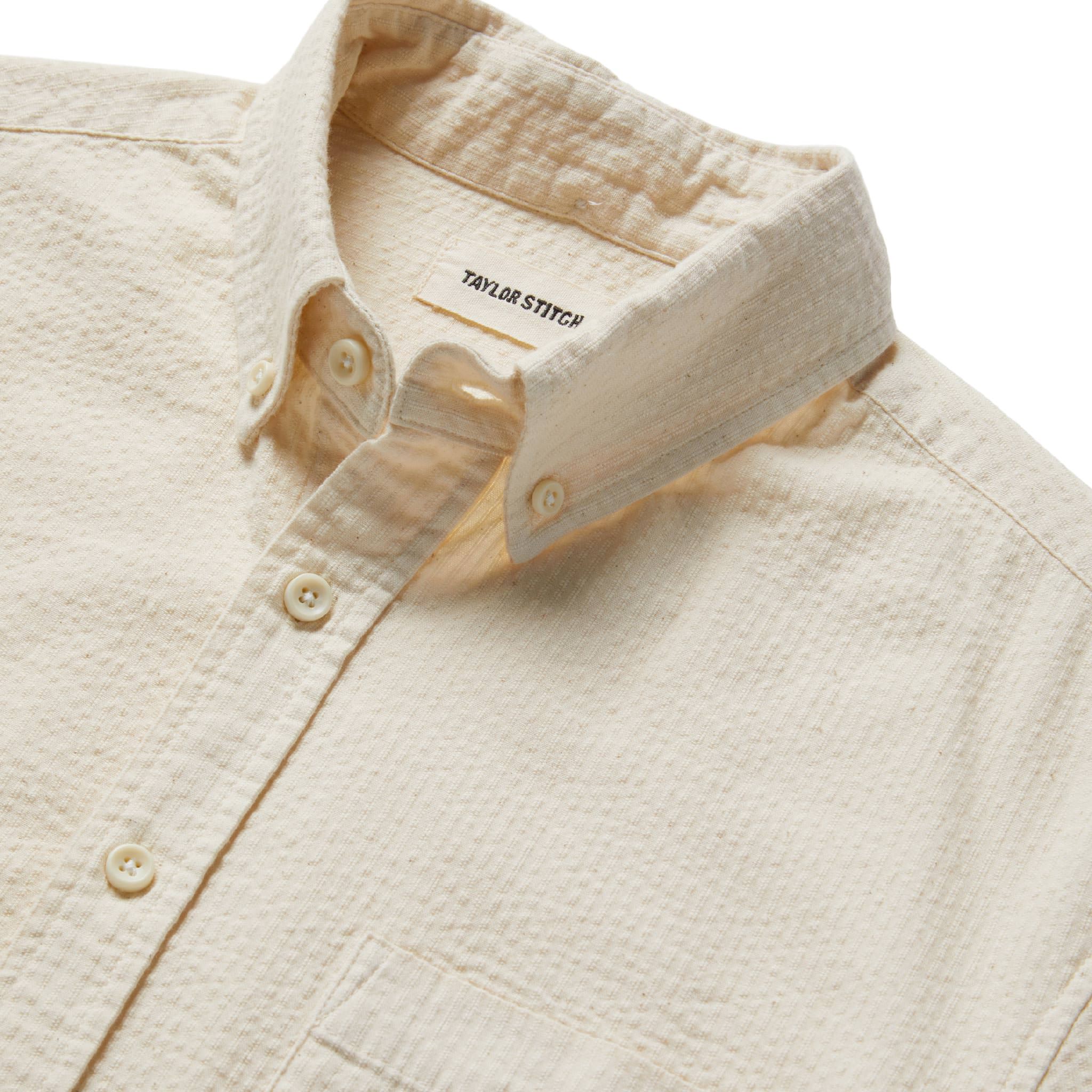 material shot of the collar and buttons of The Short Sleeve Jack in Natural Seersucker, Wovens by Taylor Stitch