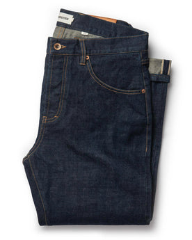 flatlay of The Slim Jean in Rinsed Organic Selvage, Bottoms by Taylor Stitch