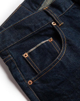 material shot of right side pocket of The Slim Jean in Rinsed Organic Selvage, Bottoms by Taylor Stitch