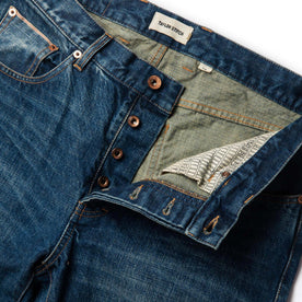 material shot of front open button fly of The Slim Jean in Sawyer Wash Organic Selvage
