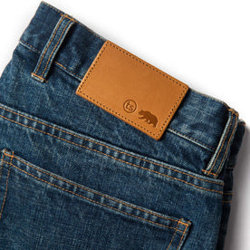 material shot of leather patch of The Slim Jean in Sawyer Wash Organic Selvage
