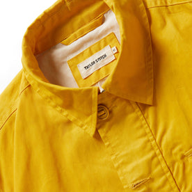 material shot of interior label of The Watts Jacket in Canary