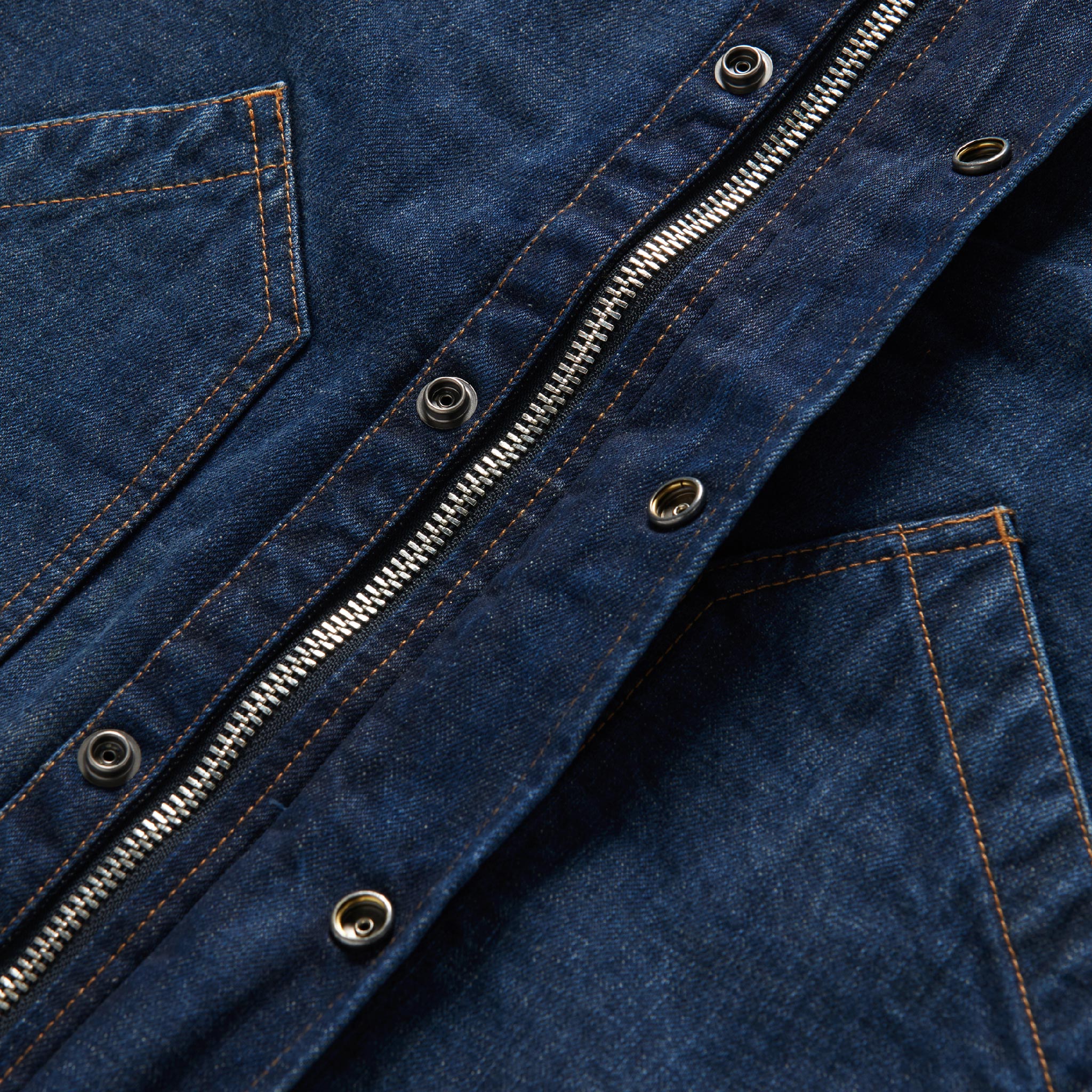 material shot of the covered zipper placket of The Workhorse Jacket in Marlowe Wash Denim, Outerwear by Taylor Stitch