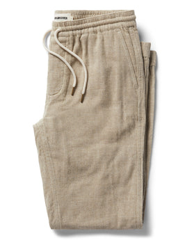 flatlay of The Apres Pant in Oat Donegal, Bottoms by Taylor Stitch