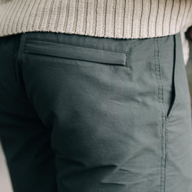fit mode showing the back pocket of The Apres Short in Sea Green Sixty Forty