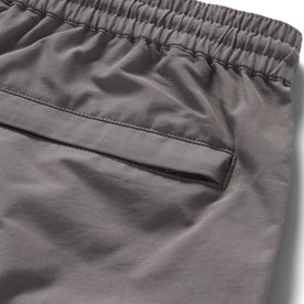material shot of the back pocket of The Apres Short in Smoke Sixty Forty