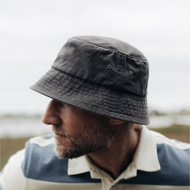 fit model posing in The Bucket Hat in Washed Taupe Twill