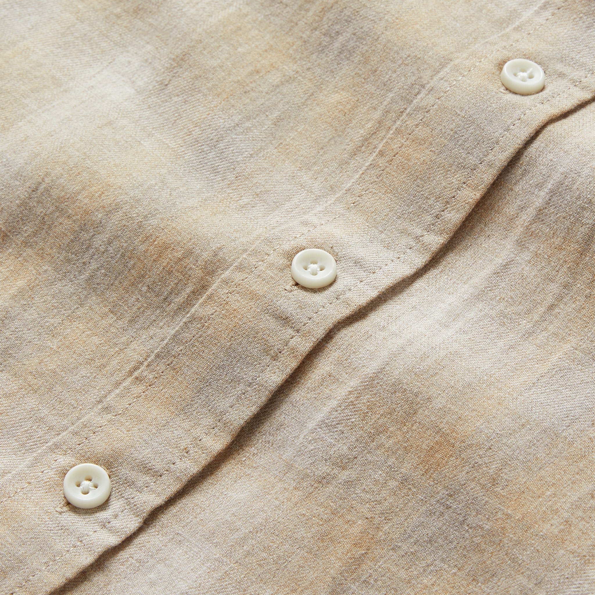 material shot of the buttons on The California Heathered Sunrise Plaid, Wovens by Taylor Stitch