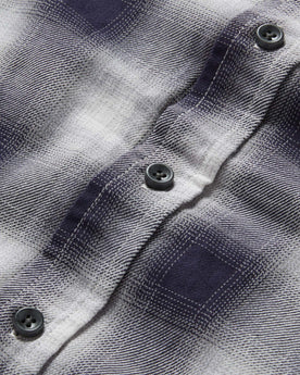 material shot of the buttons on The California in Storm Plaid Ombre Twill, Wovens by Taylor Stitch