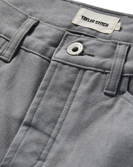 material shot of button on The Camp Pant in Gravel Boss Duck, Bottoms by Taylor Stitch