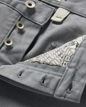 material shot of button fly on The Camp Pant in Gravel Boss Duck, Bottoms by Taylor Stitch