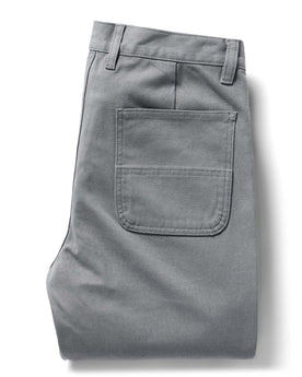 flatlay of The Camp Pant in Gravel Boss Duck, shown folded, Bottoms by Taylor Stitch