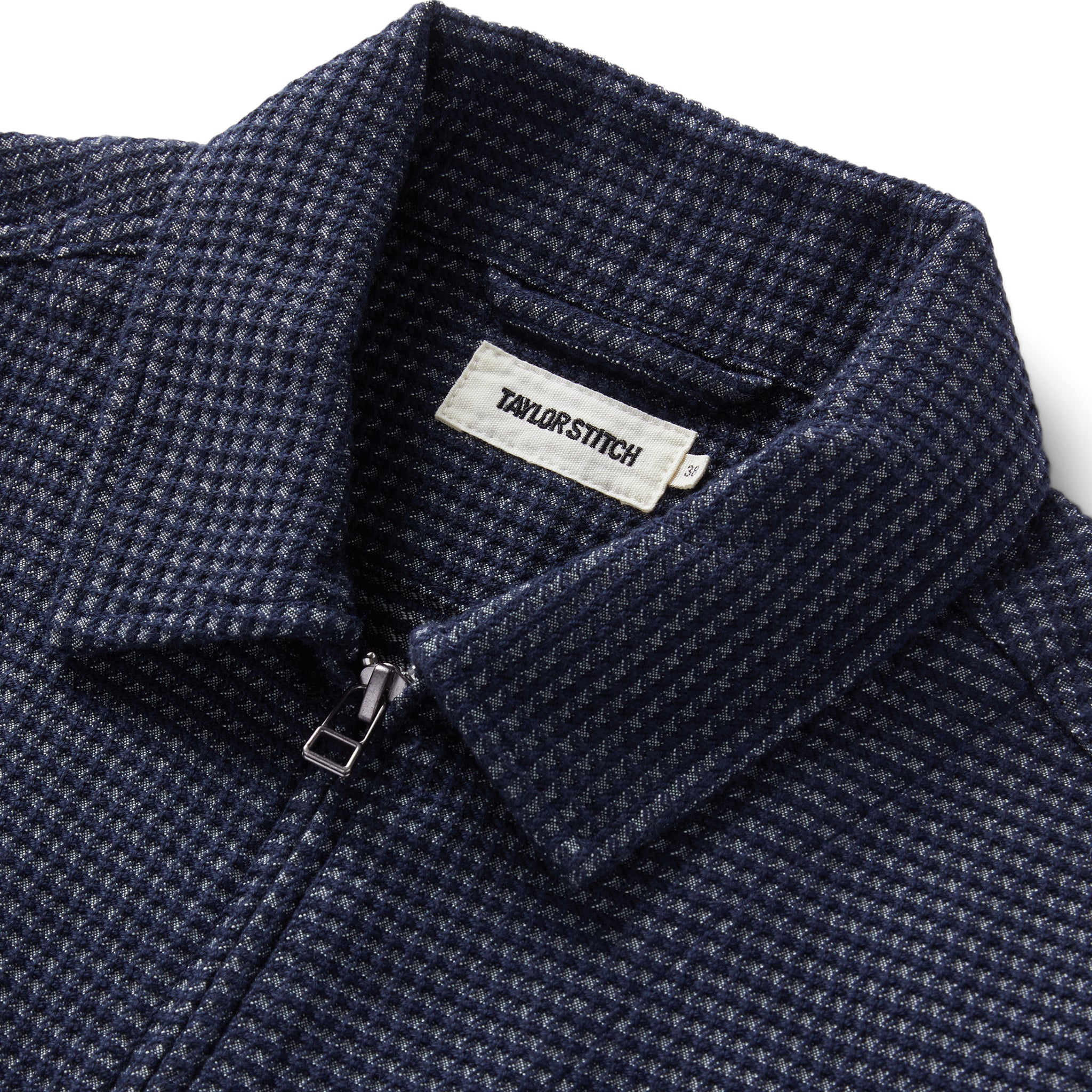 material shot of the collar on The Cavern Jacket in Navy Dobby Grid, Outerwear by Taylor Stitch