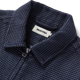 material shot of the collar on The Cavern Jacket in Navy Dobby Grid