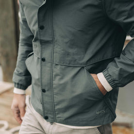 fit model with his hand in the pocket of The Chapman Jacket in Sea Green Sixty Forty