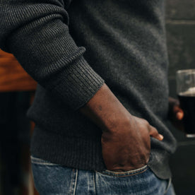 fit model showing the ribbed sleeve on The Charleston Sweater in Heather Charcoal