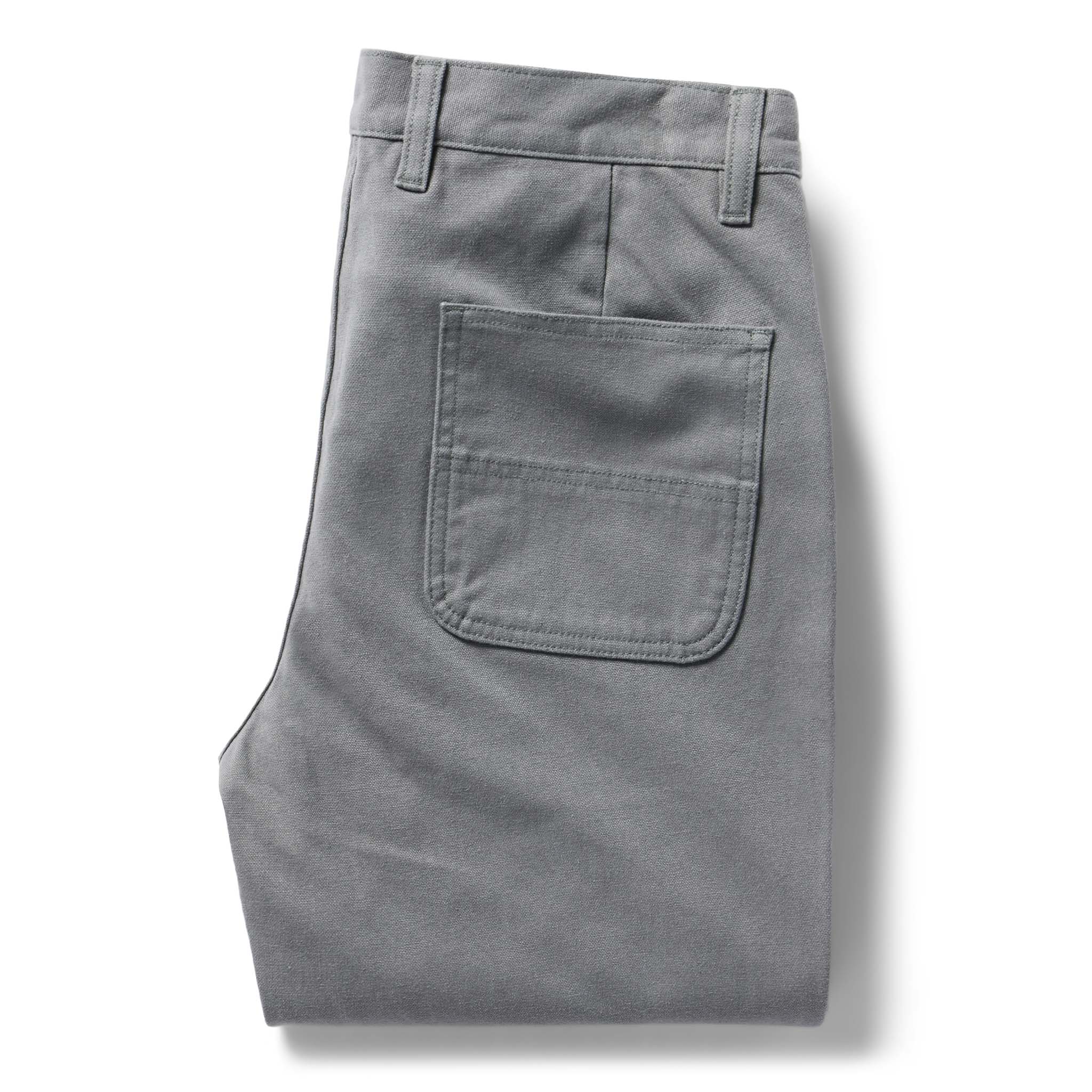 flatlay of The Chore Pant in Gravel Boss Duck, shown folded, Bottoms by Taylor Stitch