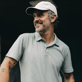 fit model showing the front of The Cotton Hemp Polo in Slate