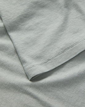 material shot of the sleeve on The Cotton Hemp Polo in Slate, Knits by Taylor Stitch