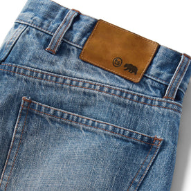 material shot of the logo patch on The Democratic Jean in Fletcher Wash Organic Selvage